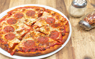 Turnkey 31 Year Kissimmee Pizza Restaurant for Sale Strong Lease!